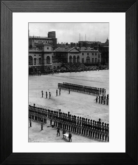 Framed Print : Army: Soldier of thA soldier is stretchered off the parade ground during the Trooping of