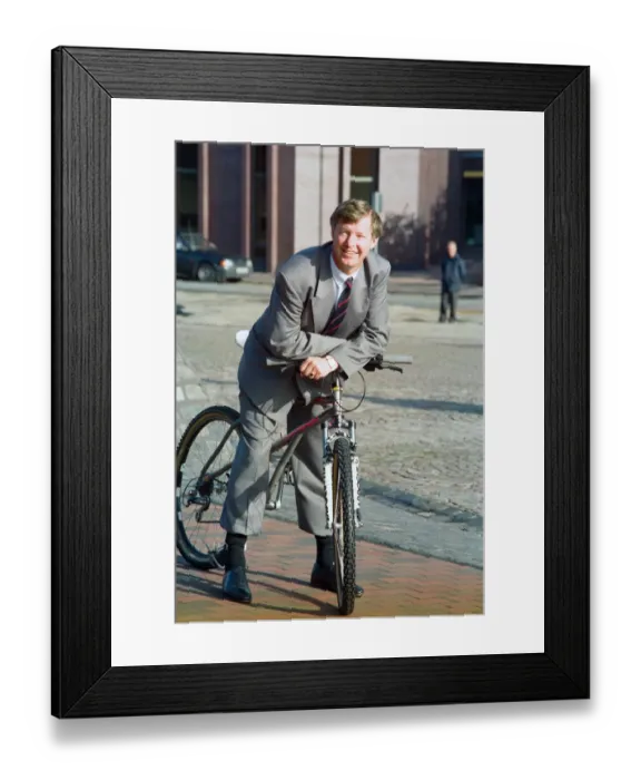Framed Print : Manchester United manager Alex Ferguson pictured on a mountain bike after opening the new