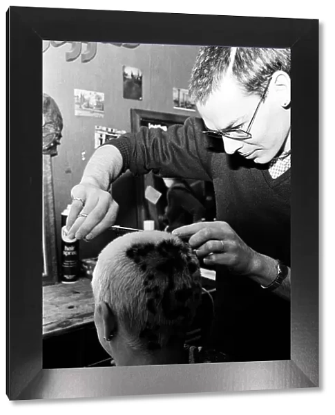 Punk Rocker Nigel Smith getting a Cheetah hairdo. 25th May 1980