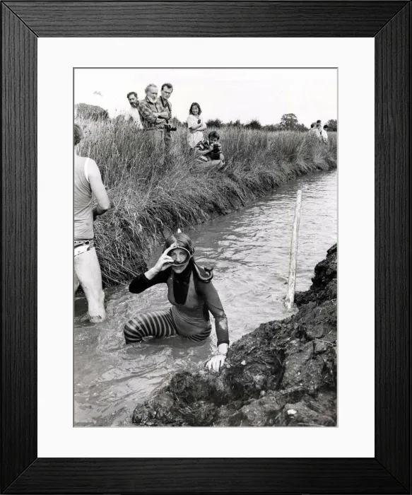 Framed Print : Up for a breather... a bog snorkeller prepares to tackle the rest of the course