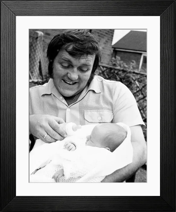 Framed Print : Les Dawson Holding a baby dbase msi Framed Print : Les Dawson Holding a baby dbase msi