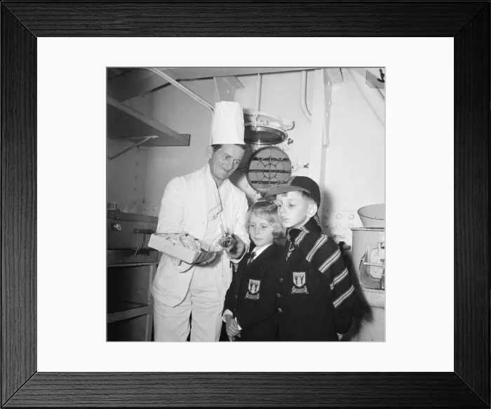 Framed Print : Mrs Sterry and her two children visit Mr Sterry, who works as an assistant crew cook Framed Print : Mrs Sterry and her two children visit Mr Sterry, who works as an assistant crew cook