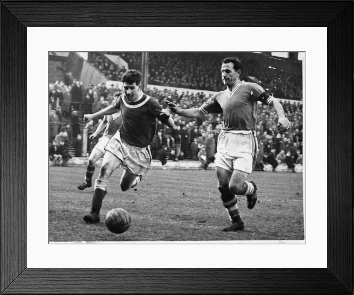Framed Print : ) looks to make a tackle against on a Doncaster Rovers forward - 8th February 1958
