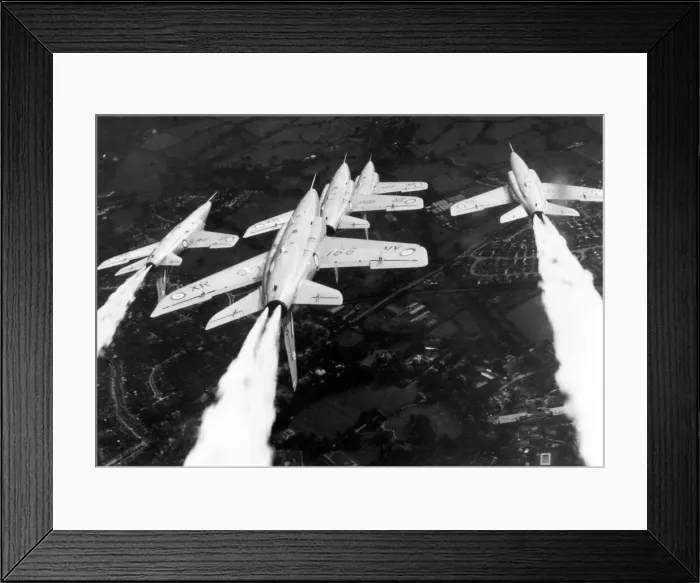 Framed Print : The RAFs Red Arrows display team perfom in their Folland Gnat aircraft