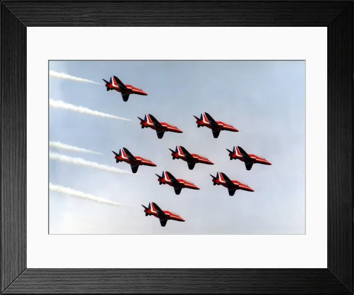 Framed Print : The RAFs Red Arrows display team perform in their BAE Hawk aircraft Framed Print : The RAFs Red Arrows display team perform in their BAE Hawk aircraft
