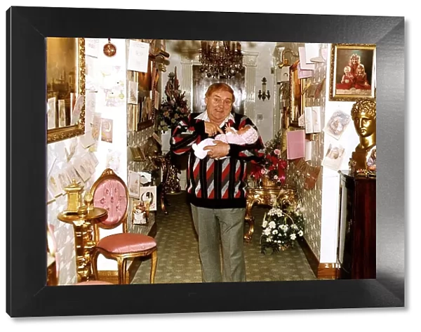 Les Dawson comedian with his baby daughter Charlotte at home A©Mirrorpix