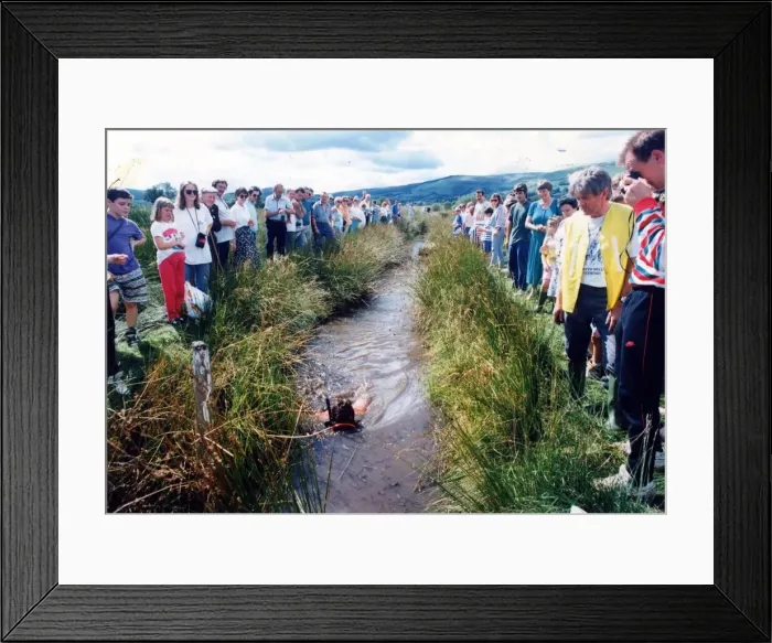 Framed Print : Sian Evans regaining her world bog snorkelling title, yesterday watched by a big crowd of Framed Print : Sian Evans regaining her world bog snorkelling title, yesterday watched by a big crowd of