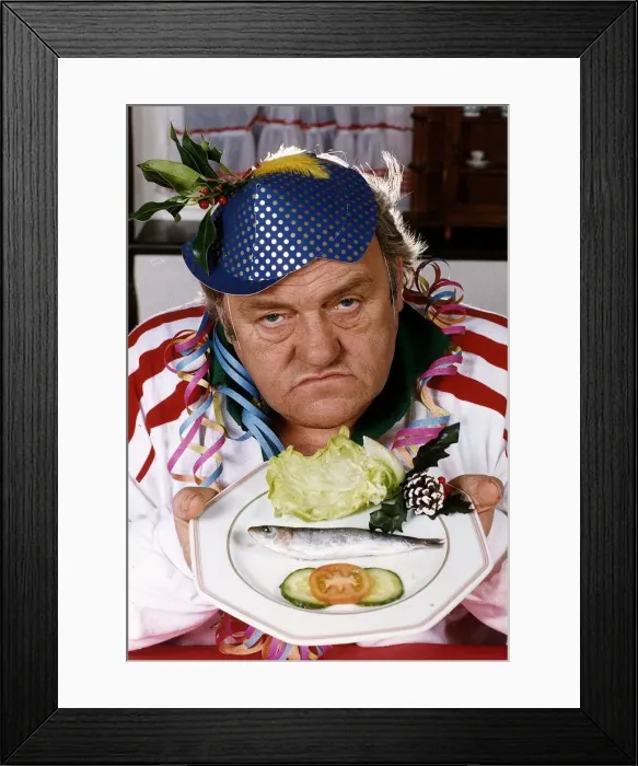 Framed Print : Les Dawson comedian with his christmas dinner Framed Print : Les Dawson comedian with his christmas dinner