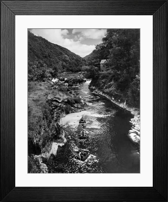Framed Print : Coracle fishers on the River Teifi at Cenarth: Following a pattern evolved over two Framed Print : Coracle fishers on the River Teifi at Cenarth: Following a pattern evolved over two