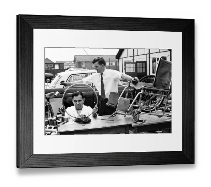 Framed Print : Engineers work on equipment for Paralympic Athletes training at Stoke Mandeville