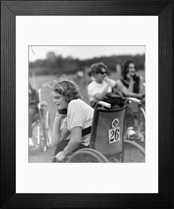 Framed Print : Paralympic Athletes training at Stoke Mandeville, watched by patients