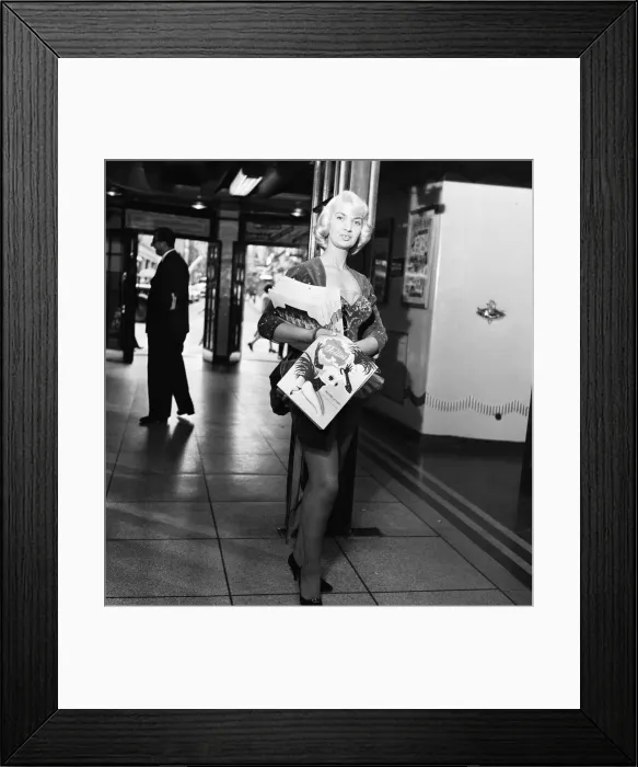 Framed Print : Eva Snyder, front of house girl at the Prince of Wales Theatre. 23rd July 1958 Framed Print : Eva Snyder, front of house girl at the Prince of Wales Theatre. 23rd July 1958