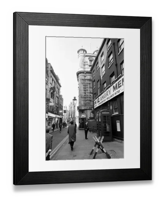 Framed Print : Scenes outside the Windmill Theatre in Soho, London after it was announced it was to