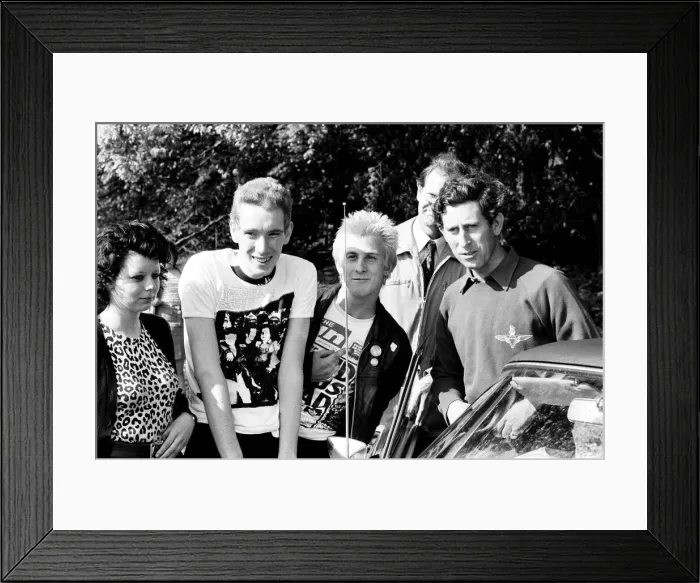 Framed Print : Prince Charles chats with Punks after a Polo match. 27th May 1979 Framed Print : Prince Charles chats with Punks after a Polo match. 27th May 1979