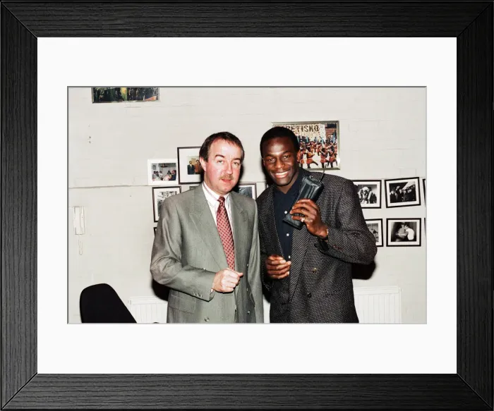 Framed Print : Justin Fashanu with new manager Frank Clarke, pictured together after his signing for Framed Print : Justin Fashanu with new manager Frank Clarke, pictured together after his signing for