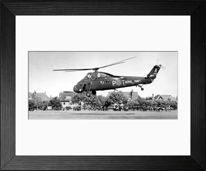 Framed Print : A Royal Navy Westland Wessex helicopter gives a demonstration to the pupils of Monkseaton Framed Print : A Royal Navy Westland Wessex helicopter gives a demonstration to the pupils of Monkseaton