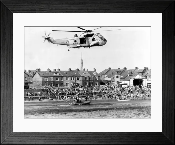 Framed Print : A RAF search and rescue Westland Sea King helicopter takes part in an exercise with Framed Print : A RAF search and rescue Westland Sea King helicopter takes part in an exercise with