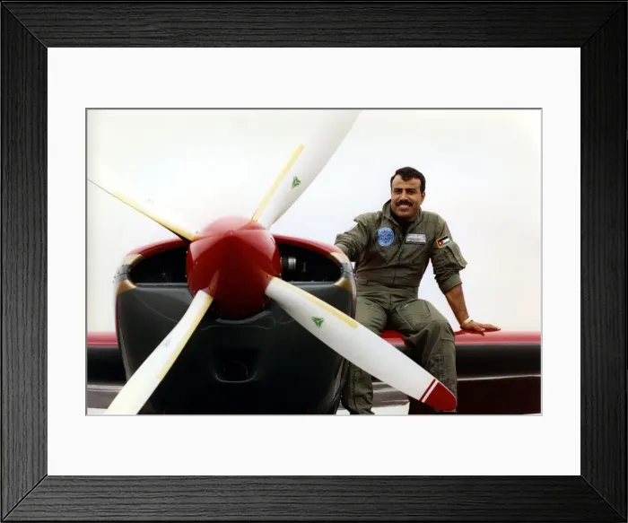 Framed Print : Royal Jordanian Falcons pilot Captain Tayseer Daboubi takes a break with his Extra EA300 Framed Print : Royal Jordanian Falcons pilot Captain Tayseer Daboubi takes a break with his Extra EA300