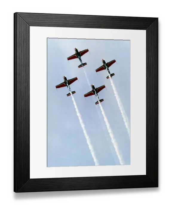 Framed Print : Royal Jordanian Falcons display team performing in their Extra EA300 aircraft Framed Print : Royal Jordanian Falcons display team performing in their Extra EA300 aircraft