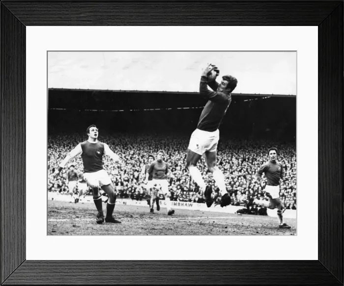 Framed Print : Davies, the Cardiff City goalkeeper gathers the ball as Arsenal