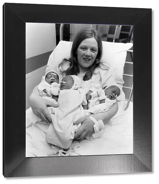 Margaret Asante with newborn children Daniella, Mellissa and Felicity