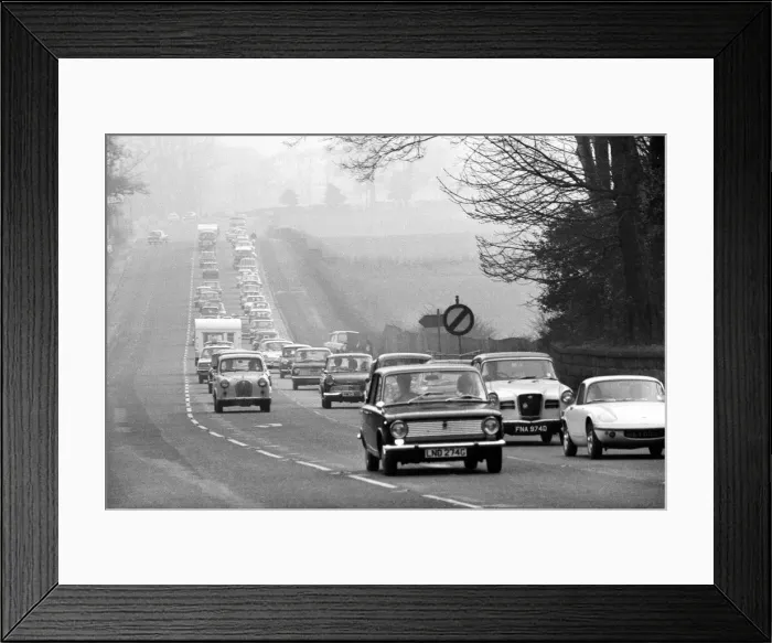 Framed Print : A long queue on Easter bank holiday monday as traffic built up when holiday makers Framed Print : A long queue on Easter bank holiday monday as traffic built up when holiday makers