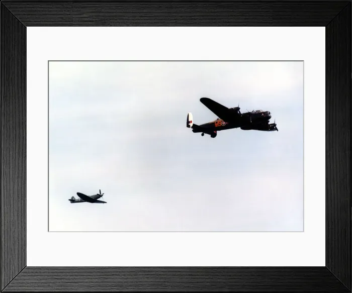 Framed Print : An Avro Lancaster bomber and Supermarine Spitfire fighter aircraft of the Battle of