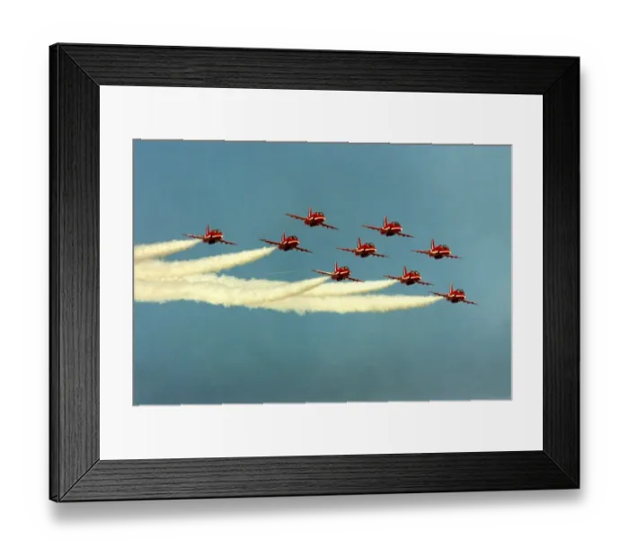 Framed Print : The RAFs Red Arrows display team perform in their BAE Hawk aircraft Framed Print : The RAFs Red Arrows display team perform in their BAE Hawk aircraft