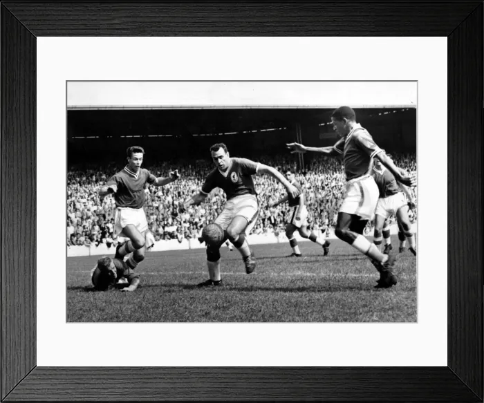 Framed Print : and Steve Mokone battle for the ball in the Liverpool goalmouth during their teams 3-2 Framed Print : and Steve Mokone battle for the ball in the Liverpool goalmouth during their teams 3-2