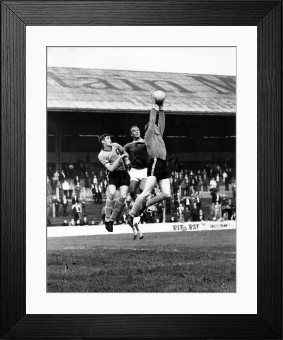 Framed Print : gather the ball under pressure from Cardiffs John Charles Framed Print : gather the ball under pressure from Cardiffs John Charles