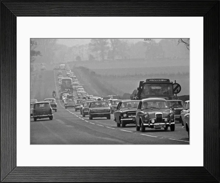Framed Print : Buses and cars queue in built up traffic along the A556 towards Manchester Framed Print : Buses and cars queue in built up traffic along the A556 towards Manchester
