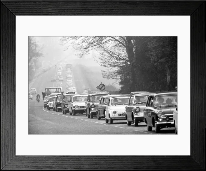 Framed Print : Traffic built up along the A556 towards Manchester, as traffic poured home from North Framed Print : Traffic built up along the A556 towards Manchester, as traffic poured home from North