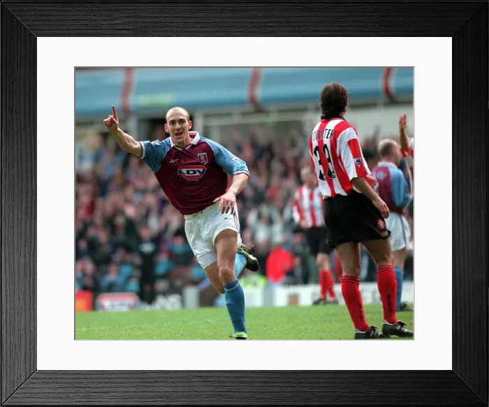 Framed Print : Mark Draper of Aston Villa celebrates scoring a goal against Southampton during Framed Print : Mark Draper of Aston Villa celebrates scoring a goal against Southampton during
