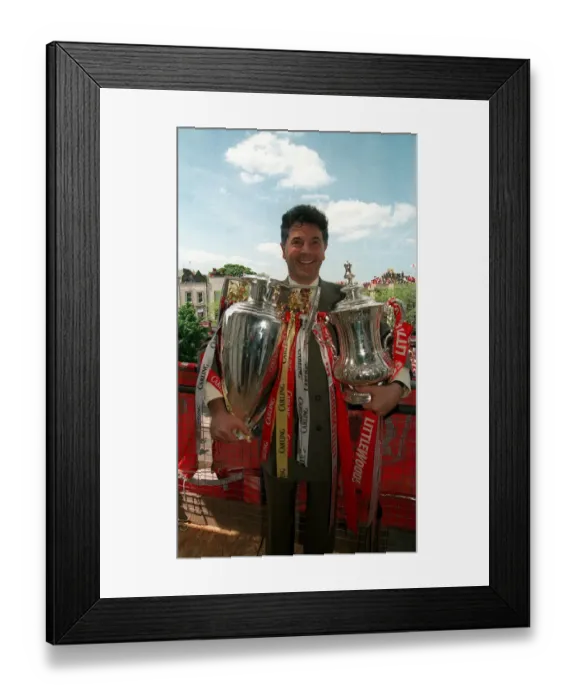Framed Print : Arsenal vice chairman David Dein with the FA Cup and League Trophy, May 1998