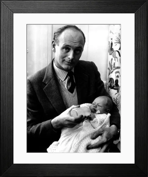 Framed Print : Lord Montagu of Beaulieu with his newborn son 1961 Ralph Montagu giving him his first
