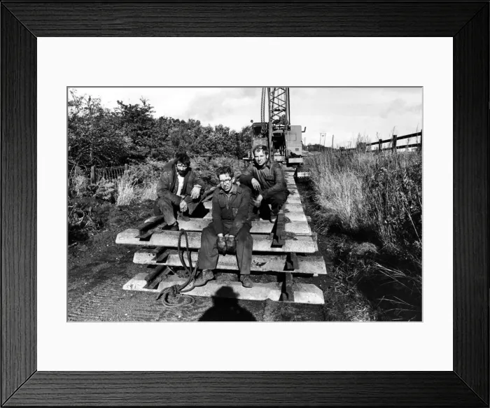 Framed Print : Railway enthusiasts Derek Cowan, Eric Maxwell and Neil Morgan taking a break from track Framed Print : Railway enthusiasts Derek Cowan, Eric Maxwell and Neil Morgan taking a break from track