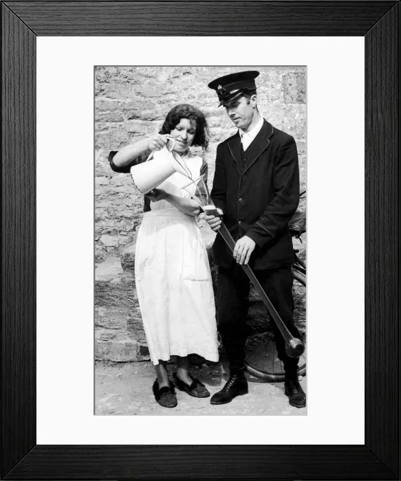 Framed Print : Hows this for a long drink?... Its his daily yard of cider that she Framed Print : Hows this for a long drink?... Its his daily yard of cider that she