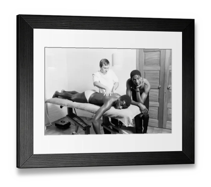 Framed Print : Justin Fashanu, Nottingham Forest Football Player, on the treatment table