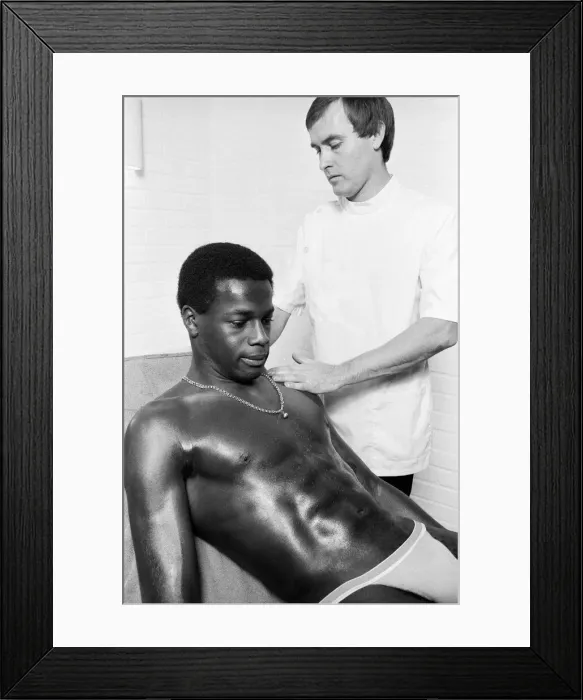 Framed Print : Justin Fashanu, Nottingham Forest Football Player, on the treatment table