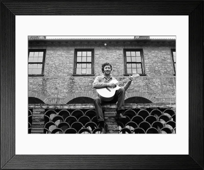 Framed Print : Eric Clapton at his spanish style home in Surrey, 23rd January 1981 Framed Print : Eric Clapton at his spanish style home in Surrey, 23rd January 1981