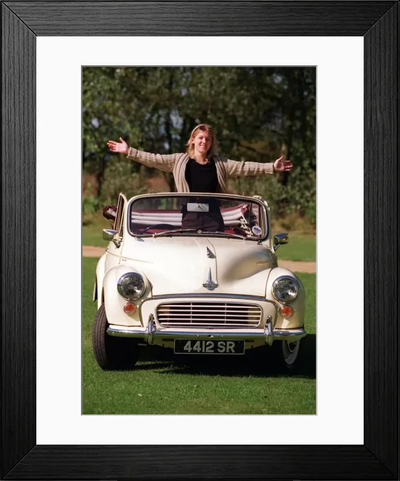 Framed Print : Kirsty Morgan standing inside her Morris Minor Tourer 16th Septeber 1997