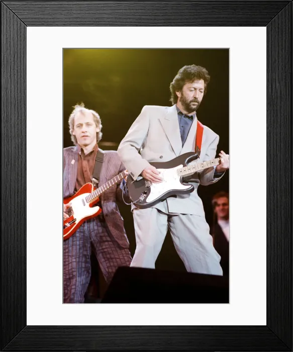 Framed Print : Eric Clapton and Mark Knopfler on stage at the Nelson Mandela 70th Birthday Tribute Framed Print : Eric Clapton and Mark Knopfler on stage at the Nelson Mandela 70th Birthday Tribute