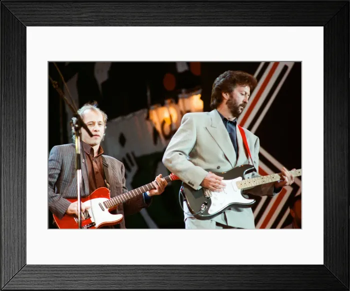 Framed Print : Eric Clapton and Mark Knopfler on stage at the Nelson Mandela 70th Birthday Tribute