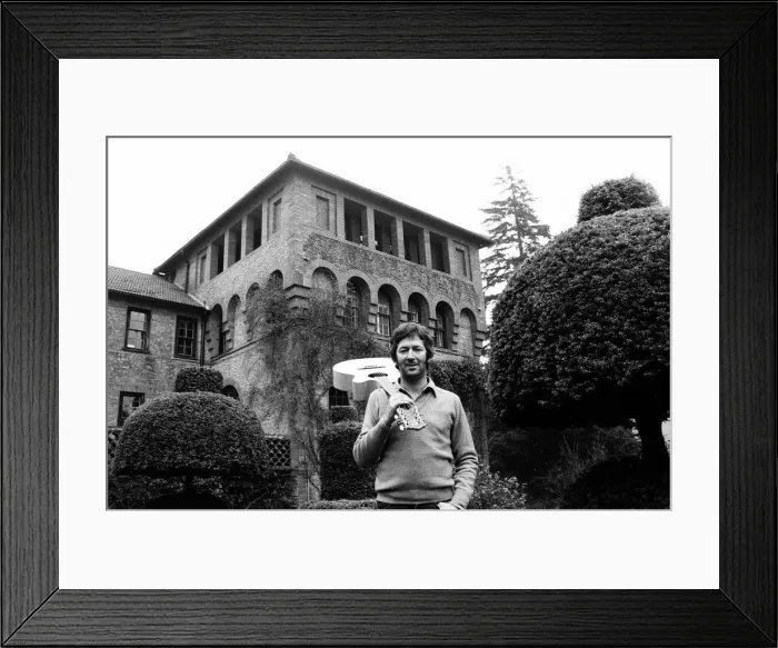 Framed Print : Eric Clapton at his spanish style home in Surrey, 23rd January 1981 Framed Print : Eric Clapton at his spanish style home in Surrey, 23rd January 1981