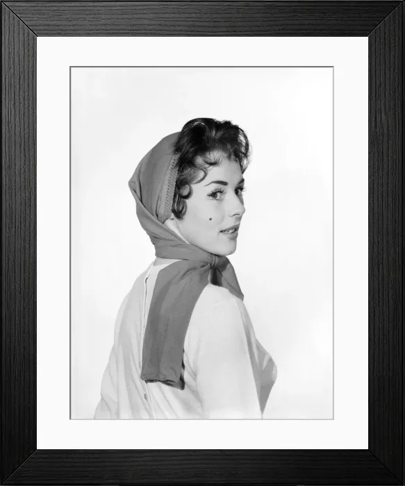 Framed Print : Clothing: Fashion: Tights: Woman wearing red pair of tights as hat. Model: Barbara Pinney Framed Print : Clothing: Fashion: Tights: Woman wearing red pair of tights as hat. Model: Barbara Pinney