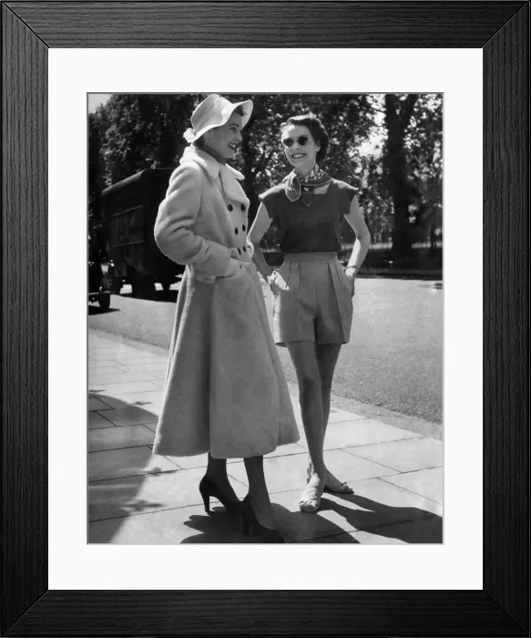 Framed Print : Two girls in mid-summer heat wearing different clothes was caused by two models who were