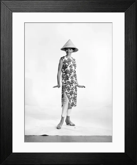 Framed Print : Clothing: Fashion: Beachwear: Woman wearing bathing dress and cap. Model: Meriel Weston