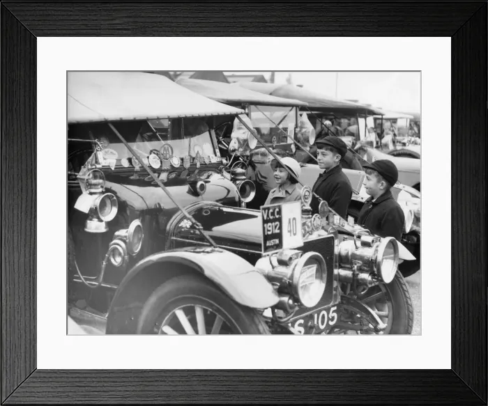 Framed Print : What a funny car, these youngsters seem to be saying as they look at this Framed Print : What a funny car, these youngsters seem to be saying as they look at this