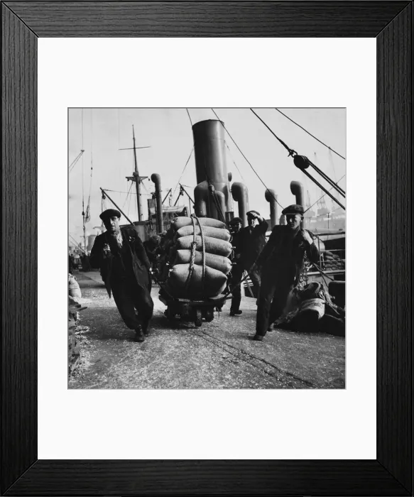 Framed Print : Dried beans being unloaded at Liverpool Dock, 21st February 1942 Framed Print : Dried beans being unloaded at Liverpool Dock, 21st February 1942