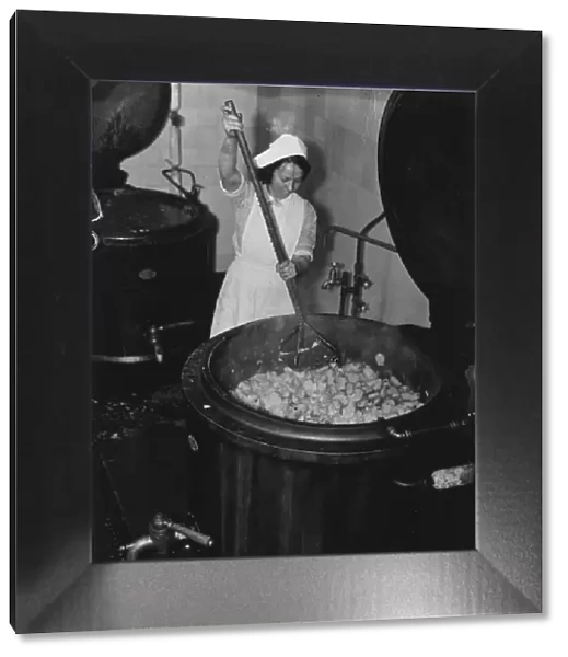 A woman mashing potatoes to feed the poor in Liverpool, 'Labour